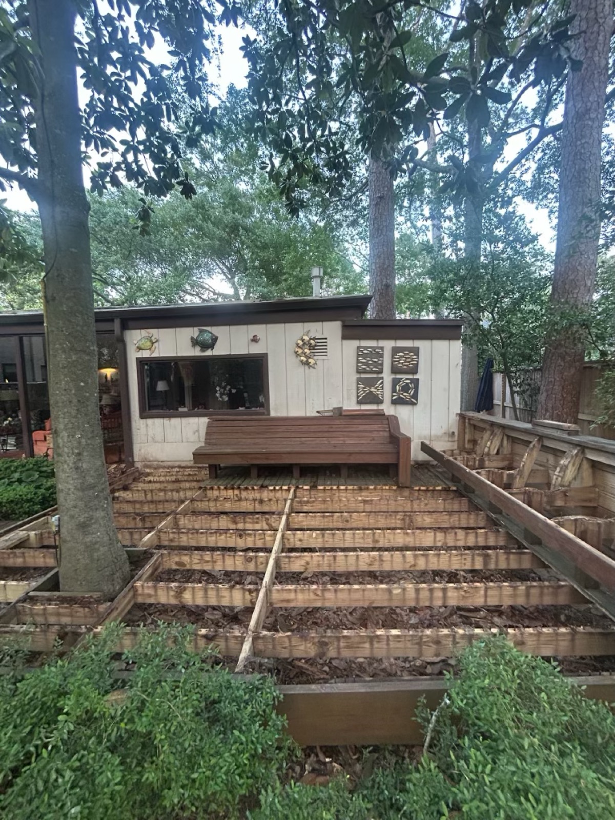 Deck boards removed down to the joists and hauled off