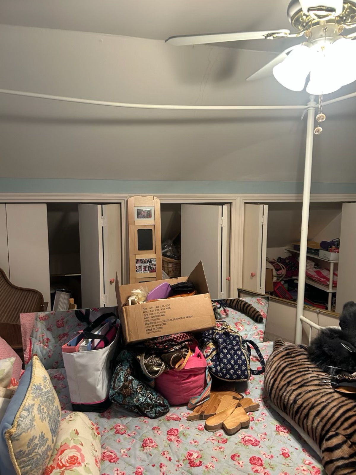 Bedroom and closets cluttered before cleanout